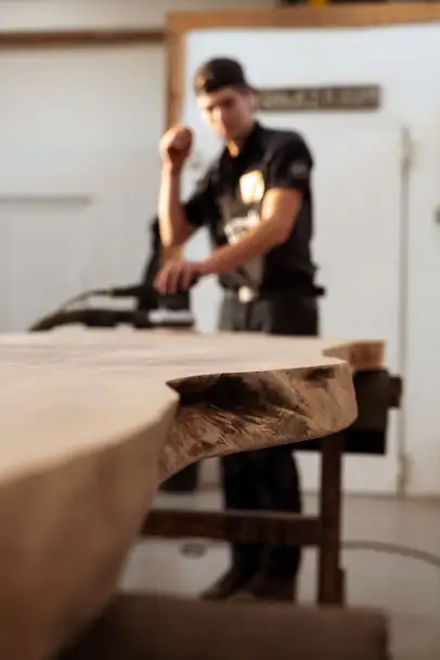 Live edge table is hand-sanded in the Stammdesign manufactory – crafting a modern solid wood designer table