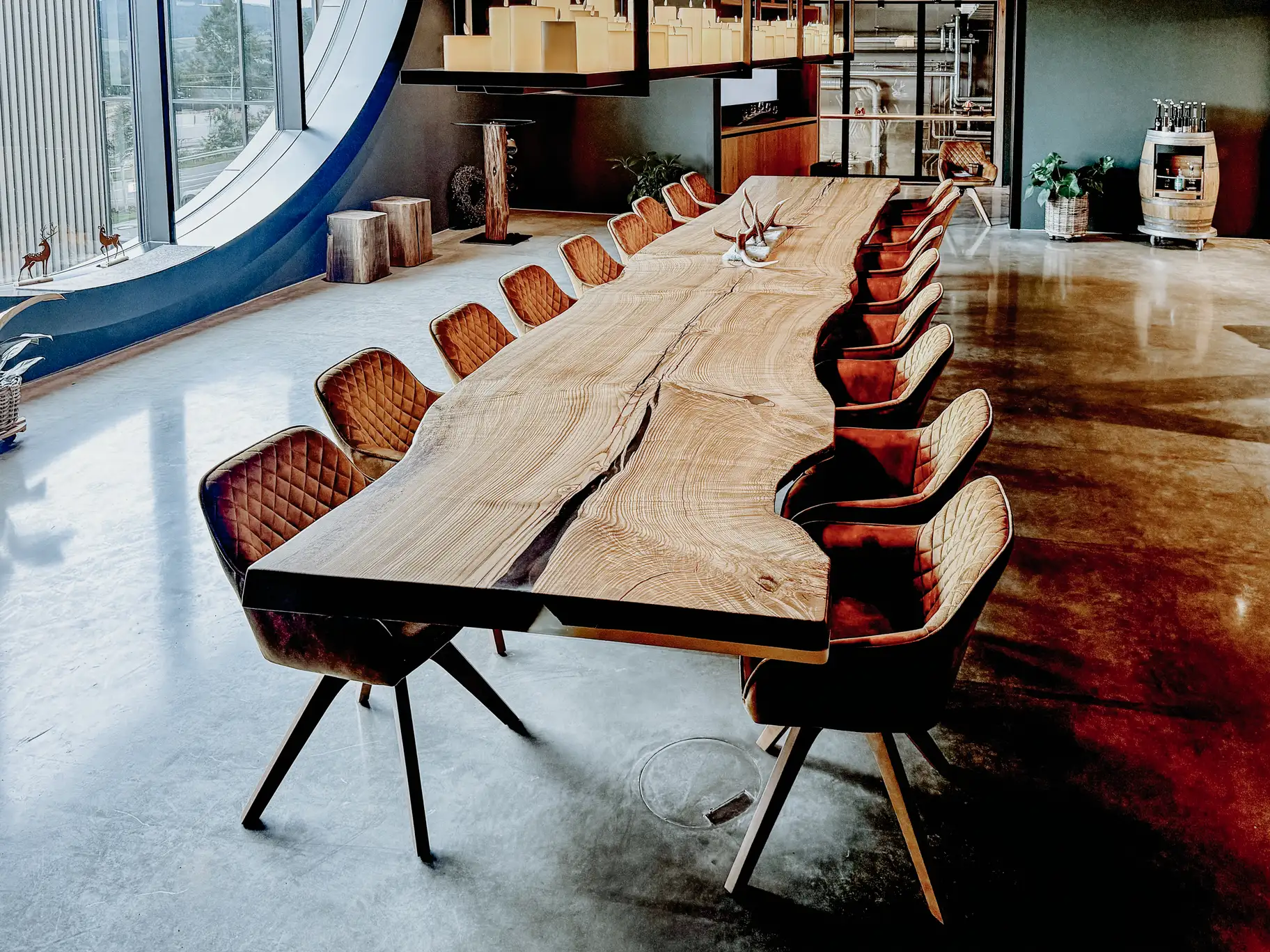 Large natural table by Stammdesign with organic shape, natural wood character and floating appearance