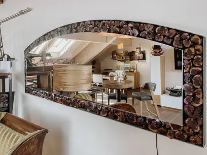 Exclusive design wall mirror made from vine wood by Stammdesign.