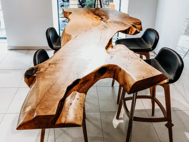Exclusive standing table made from a tree trunk with sturdy glass legs by Stammdesign, crafted from pear wood.