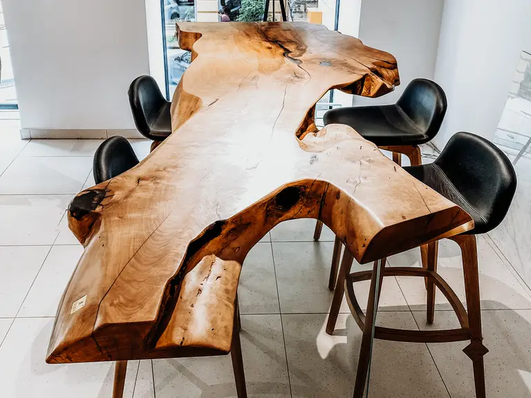 Exclusive standing table made from a tree trunk with sturdy glass legs by Stammdesign, crafted from pear wood.