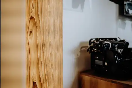 Floor lamp with wood texture for elegant living rooms by Stammdesign.