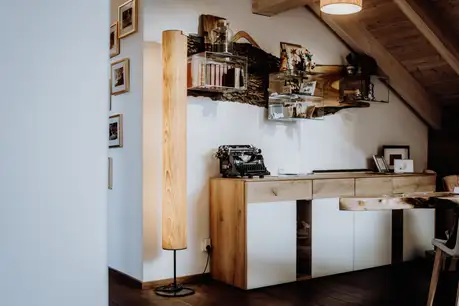 Floor lamp with wood texture for elegant living rooms by Stammdesign.