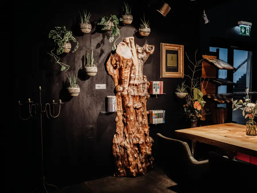 Unique tree trunk wall decoration for modern interiors by Stammdesign, a one-of-a-kind piece.