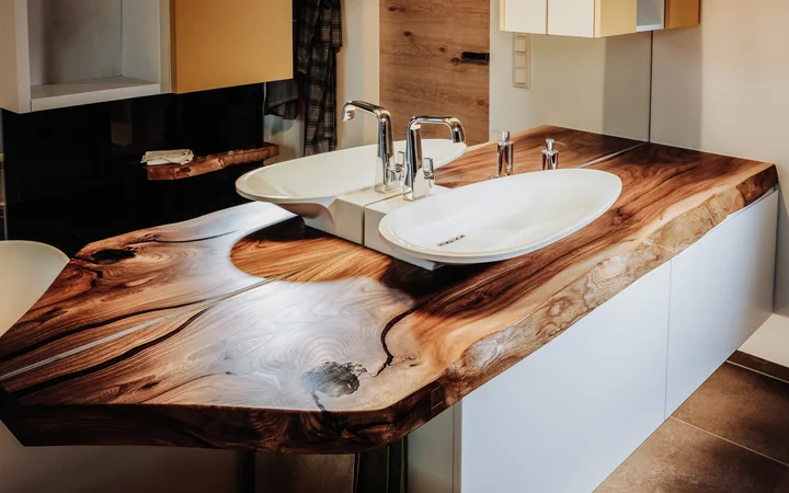 Washbasin made from a tree trunk with distinctive tree edge by Stammdesign for hotels and bathrooms, view 1.