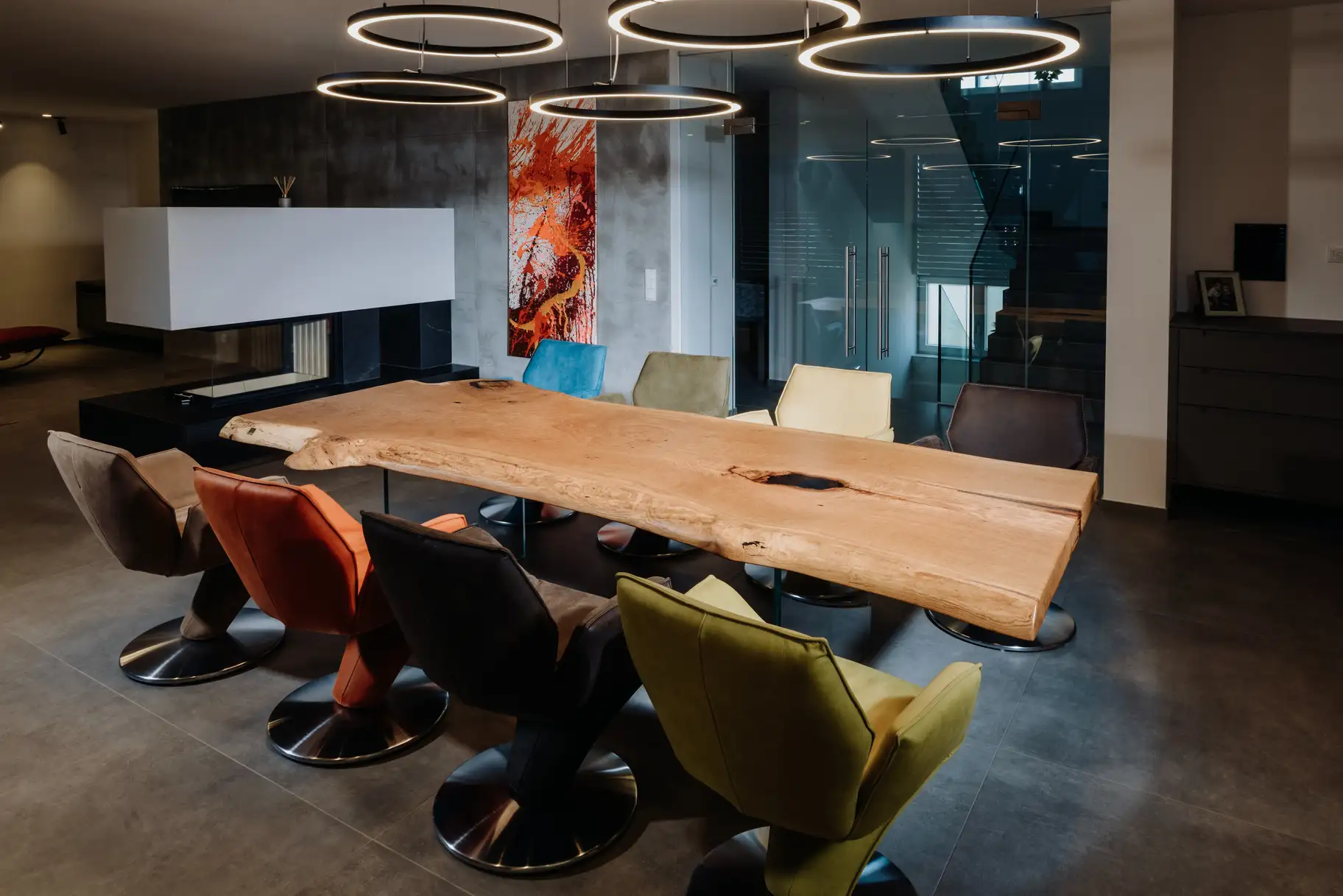 Solid natural wood table made from an oak tree trunk with expressive grain, view 2